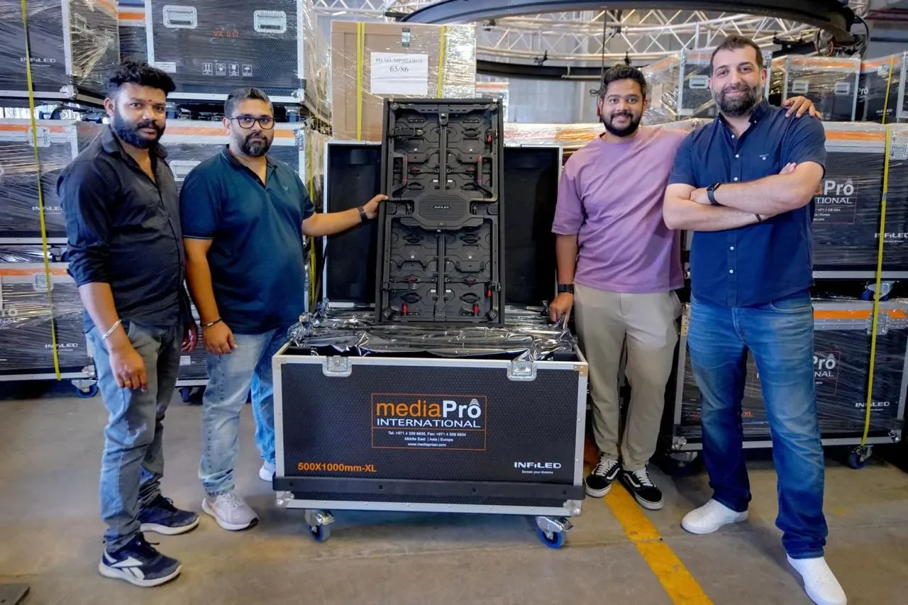 Infiledright employee with mediapro staffleft.jpg